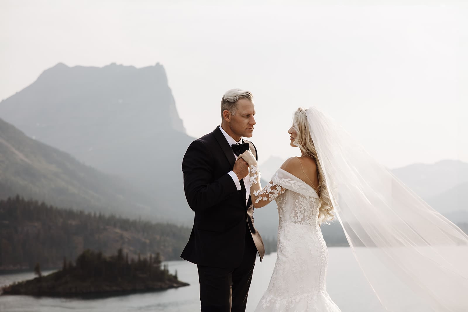 Photo of bride and groom during sunset elopement in Glacier National Park