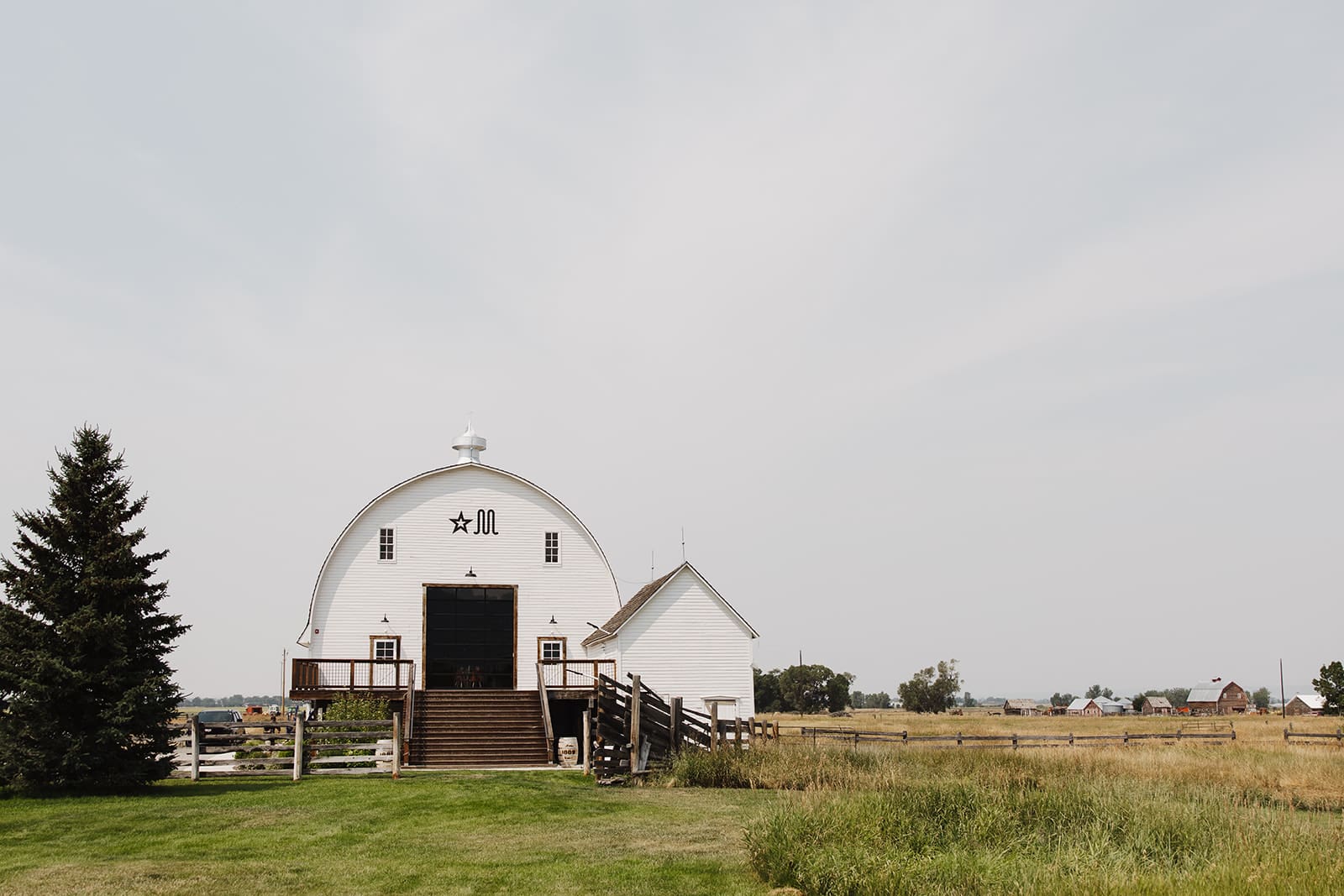Star M Barn wedding venue in Bozeman, MT. Surrounded by the bridger mountains.