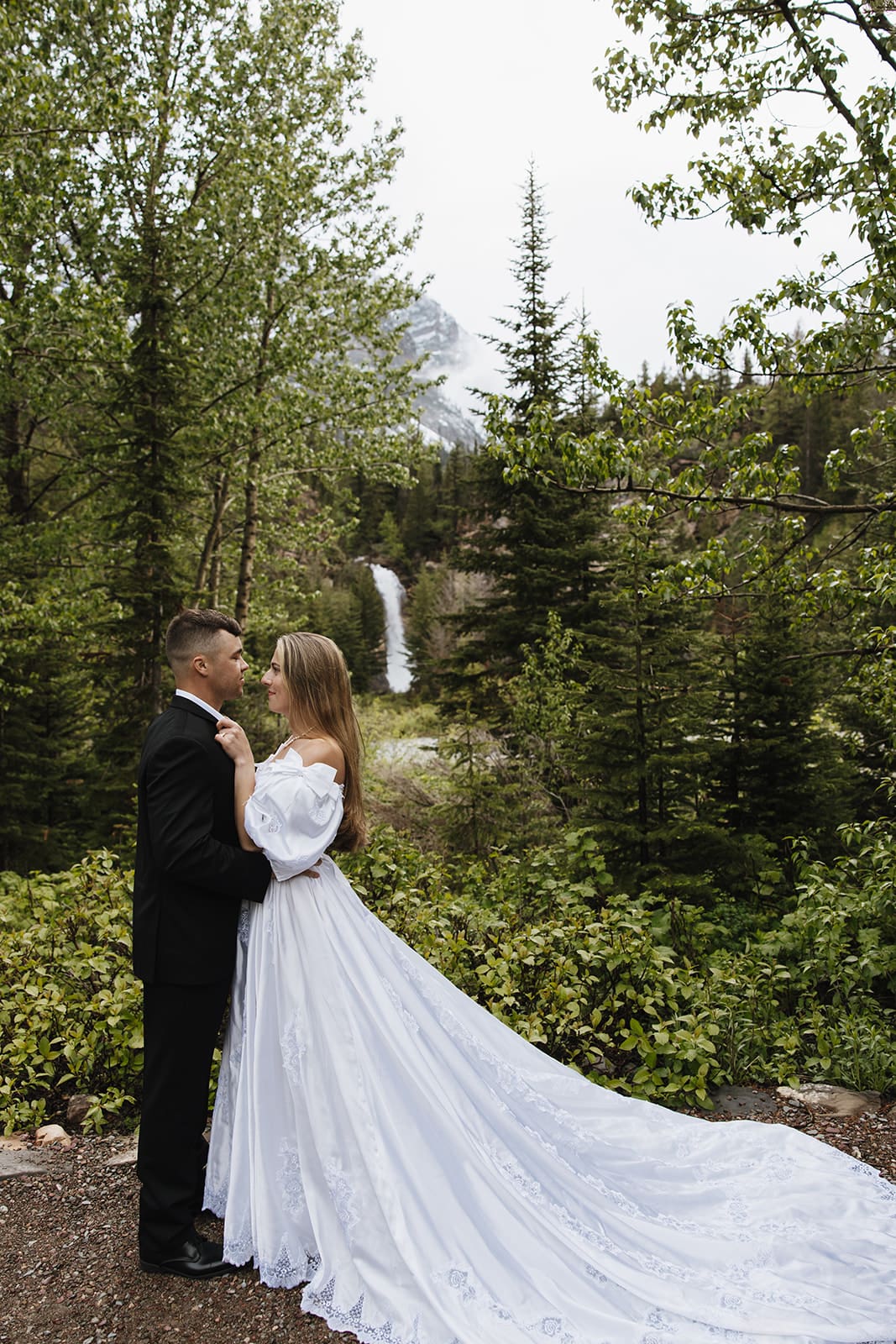 Montana elopement ceremony by waterfall