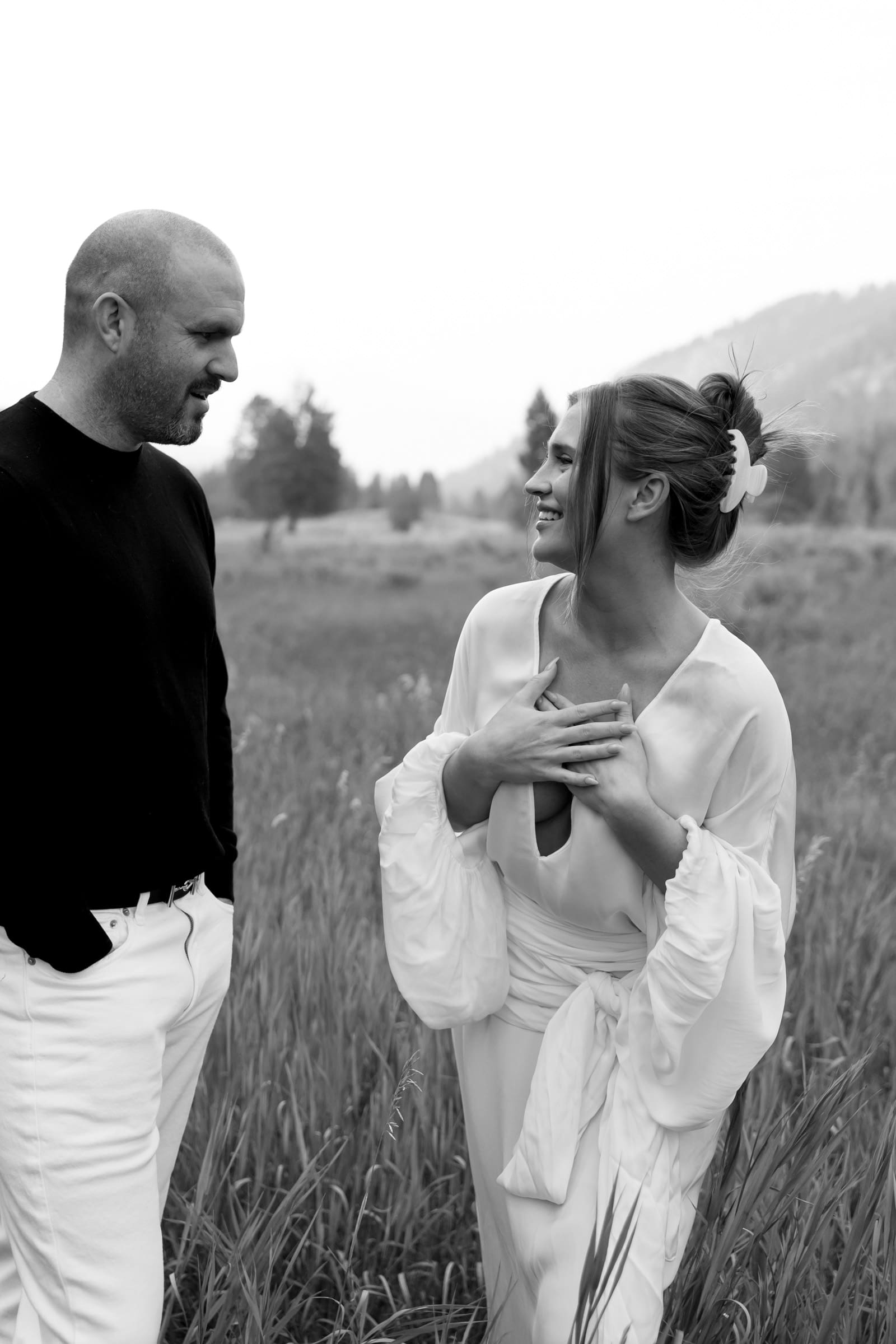 Bride-to-be wearing an elegant gown during a luxury engagement photoshoot in Big Sky.