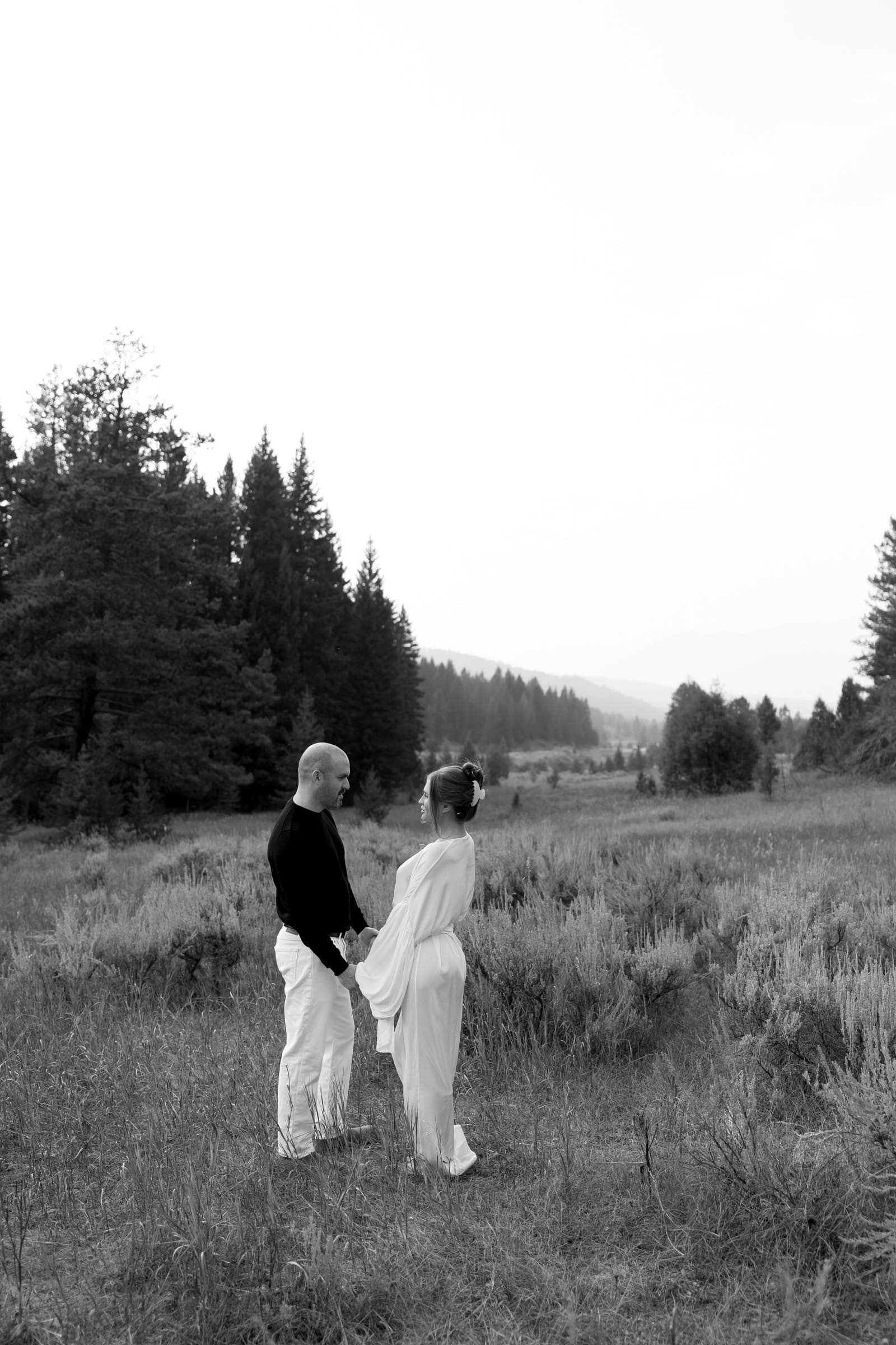Luxury Montana engagement session highlighting cinematic mountain scenery.