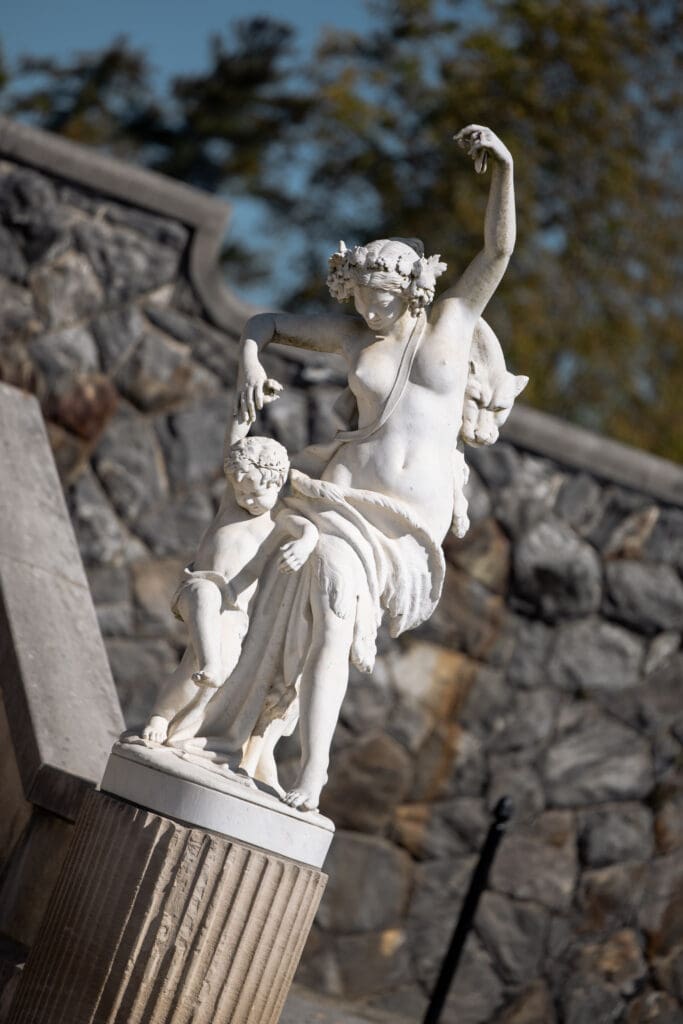 Classical stone statue on the grounds of the Biltmore Estate, captured for refined Biltmore wedding photos by a luxury Biltmore wedding photographer.
