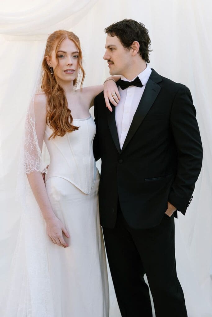 A clean, fashion-forward portrait by Santa Barbara Editorial Destination Wedding Photographer Frazier & Co., showcasing refined silhouettes and intentional composition. This imagery reflects the elevated aesthetic couples seek when choosing California wedding venues outdoor for an editorial destination celebration.