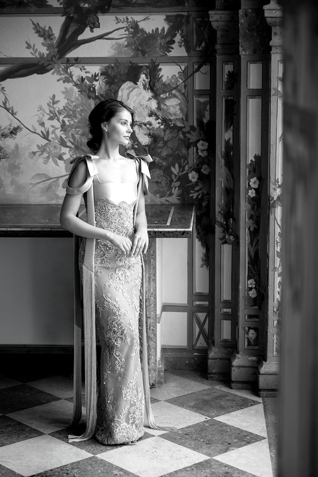 Bride in beaded lace designer gown with flowing cape, classical Roman estate wedding, luxury wedding photographer Rome